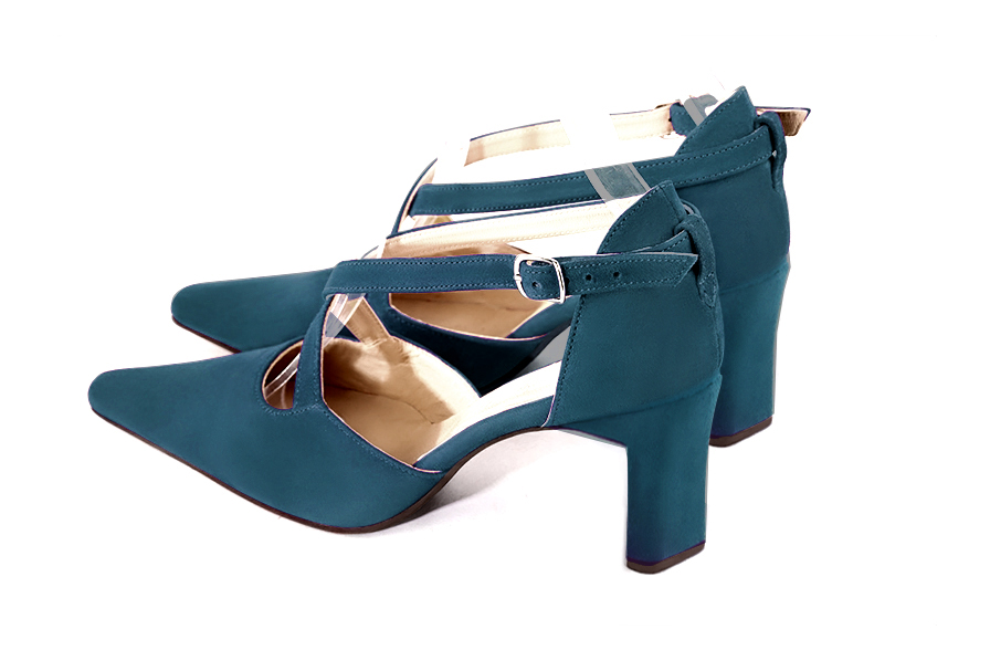 Women's peacock blue open side dress shoes, with crossed straps. Tapered toe. High comma heels - Rear view